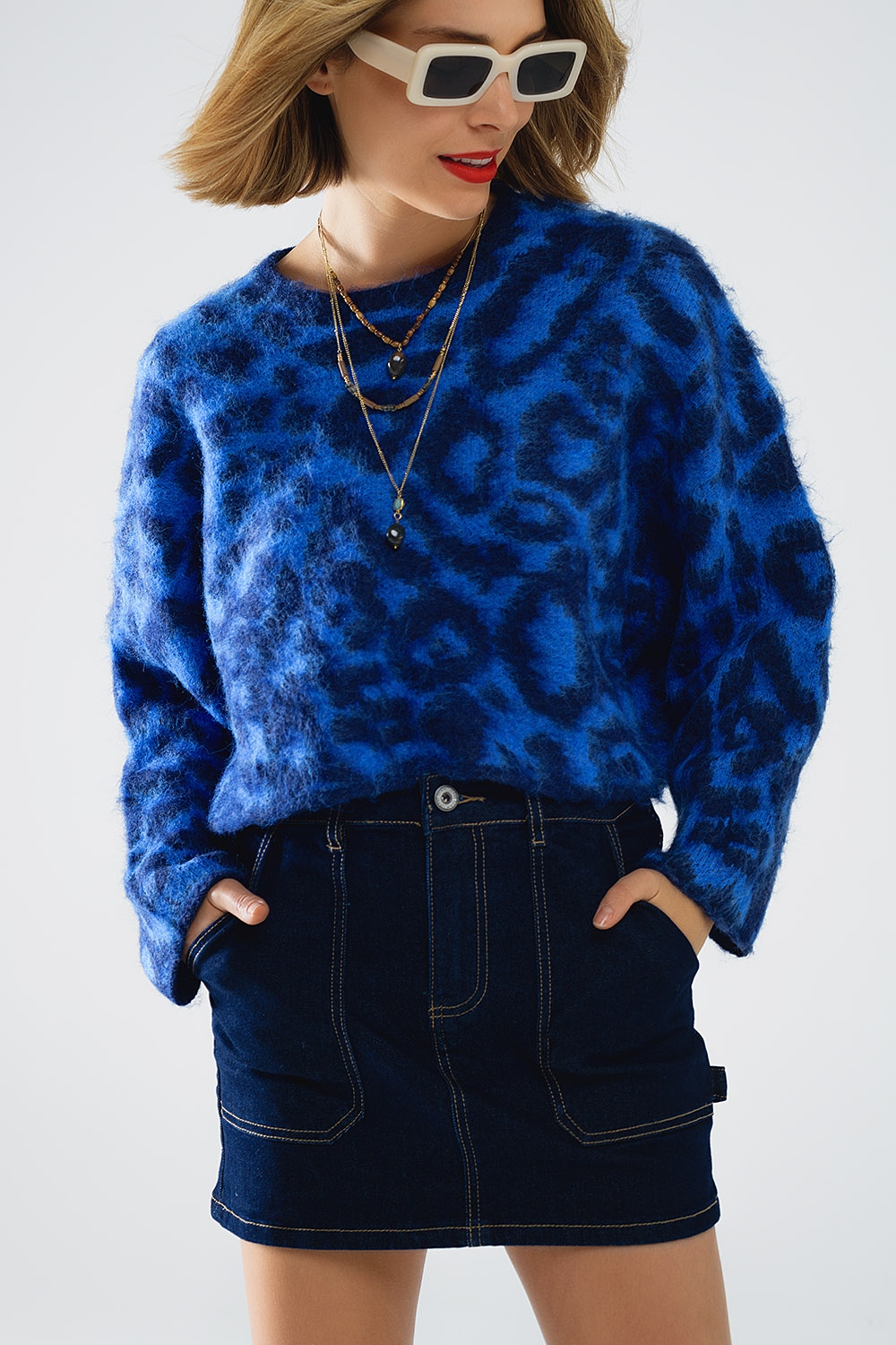 Jersey azul con estampado de leopardo de punto con lana Jersey azul con estampado de leopardo de punto con lana
