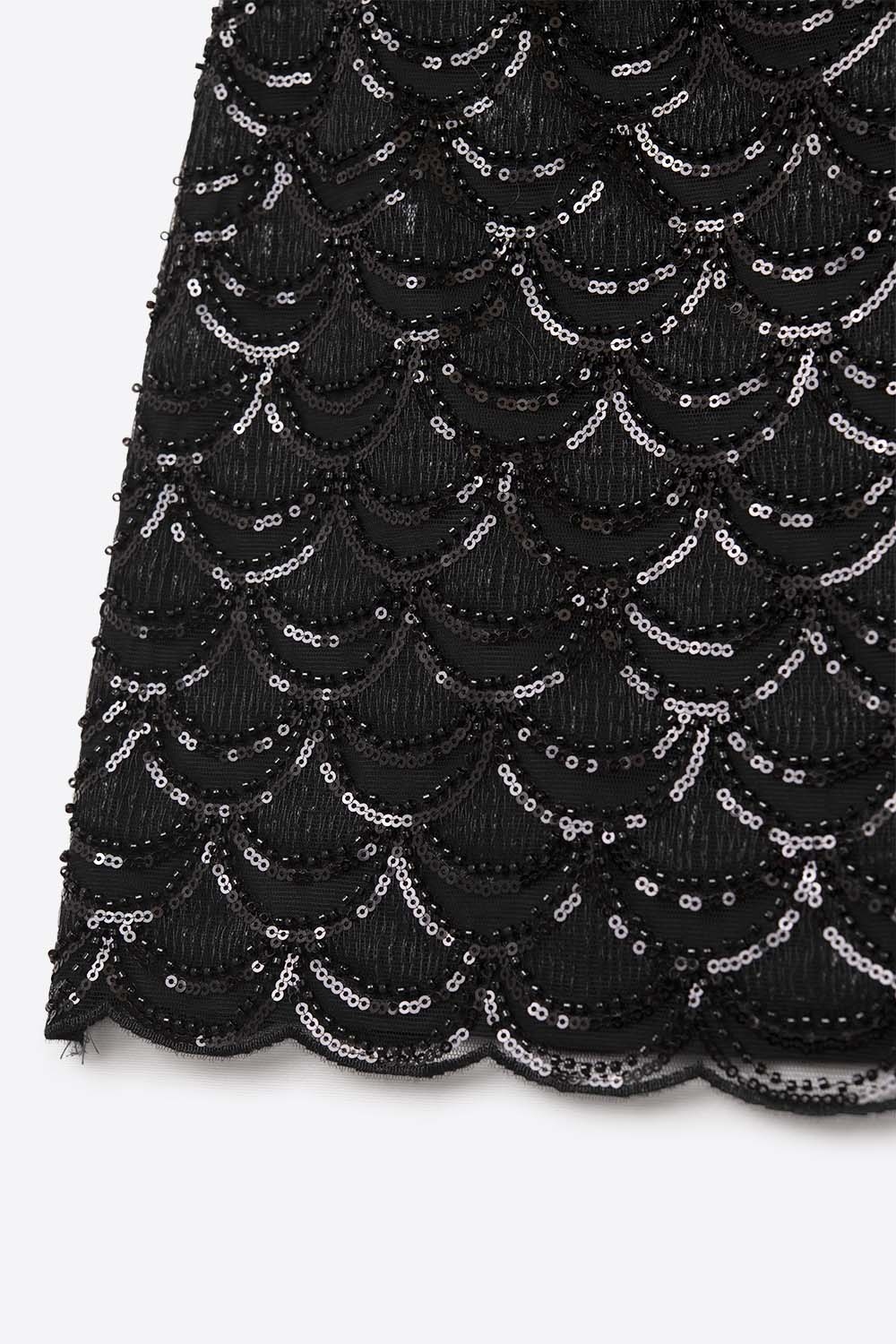 Minifalda de lentejuelas festoneadas en negro