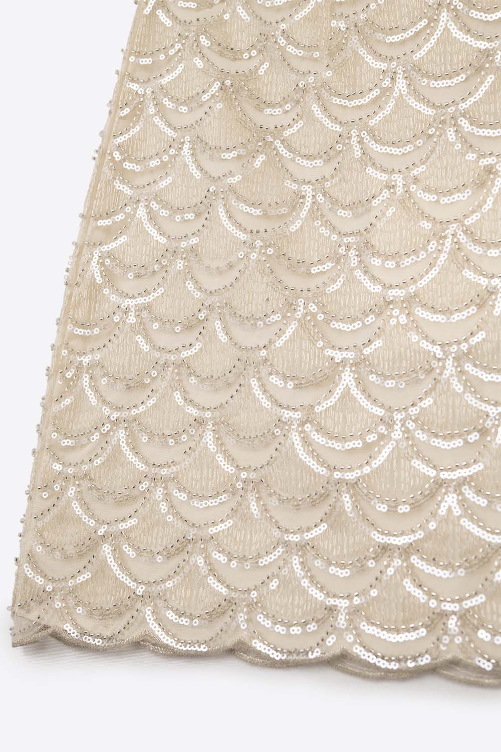 Minifalda de lentejuelas festoneadas en crema
