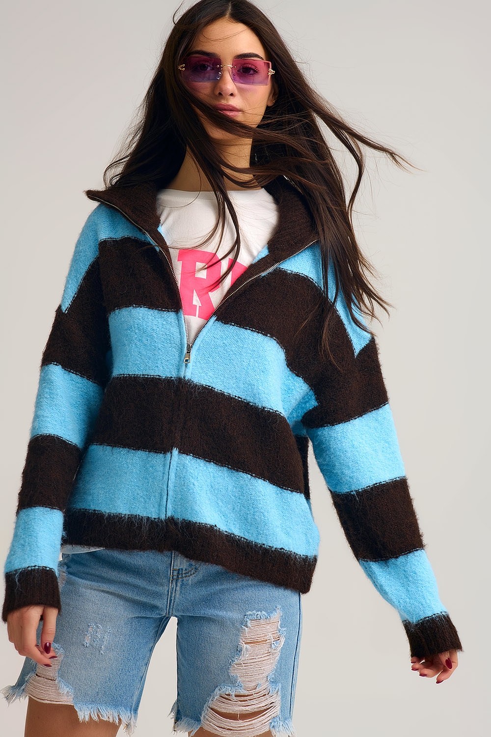 Chaqueta de punto azul con cremallera y rayas marrones Chaqueta de punto azul con cremallera y rayas marrones