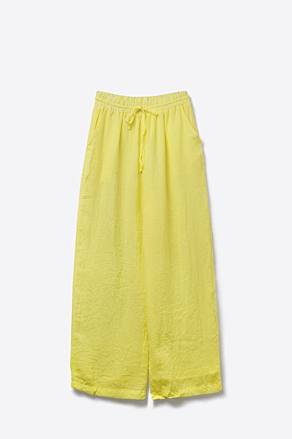 Pantalones amarillos de pierna ancha con cordón y tela transparente Pantalones amarillos de pierna ancha con cordón y tela transparente