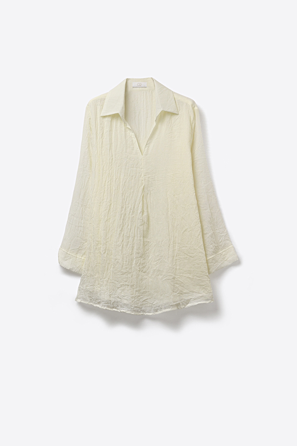 Camiseta Túnica de Ajuste Relajado en Crema con Tela Transparente Camiseta Túnica de Ajuste Relajado en Crema con Tela Transparente