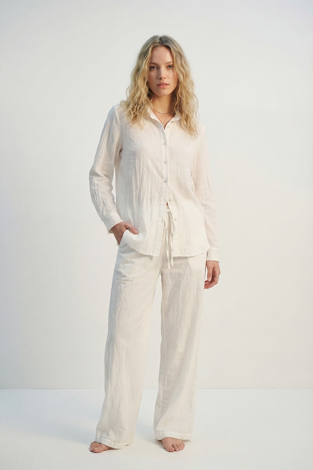 Crema Pantalones ligeros arrugados de pierna ancha con cintura elástica Crema Pantalones ligeros arrugados de pierna ancha con cintura elástica