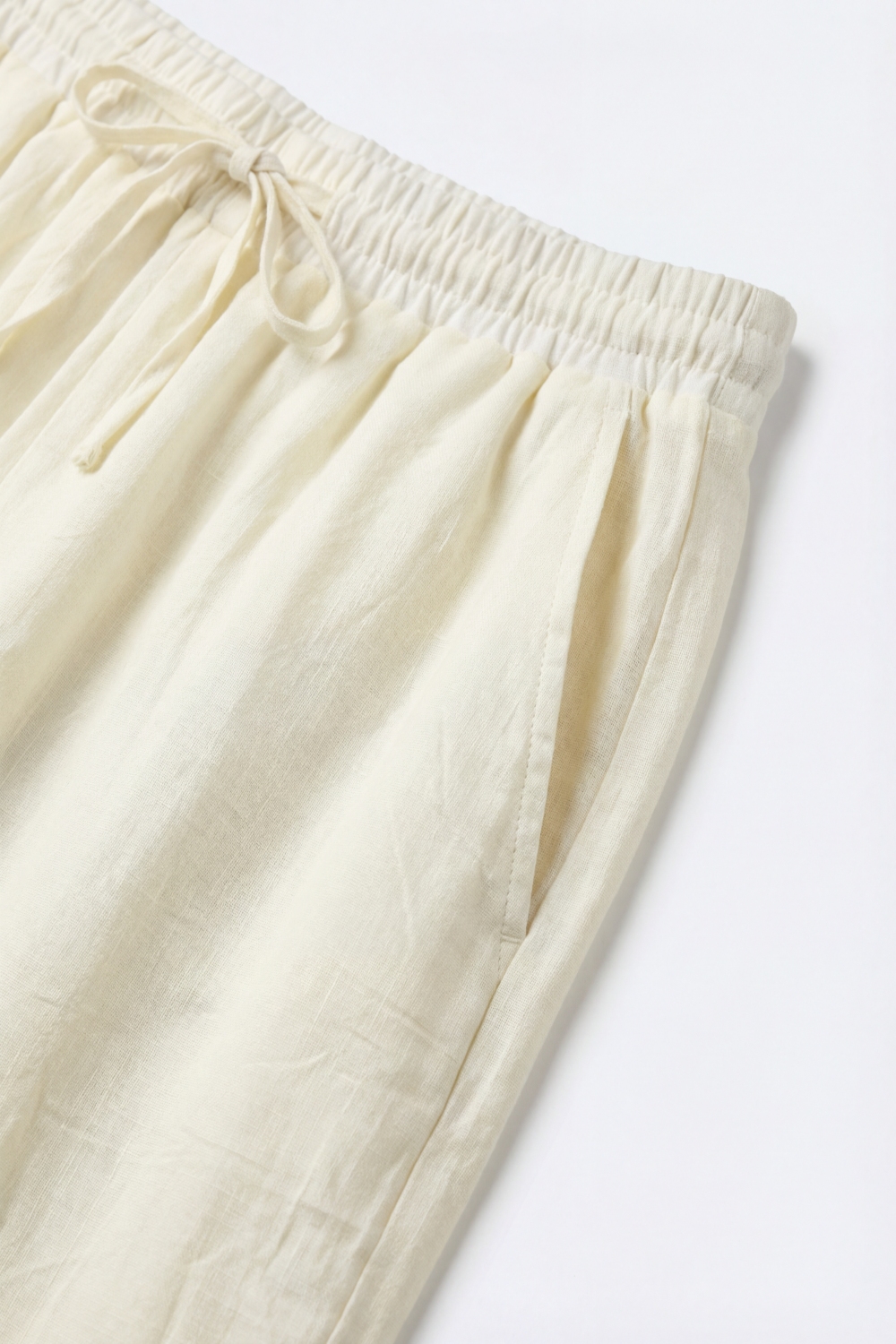 Crema Pantalones ligeros arrugados de pierna ancha con cintura elástica Crema Pantalones ligeros arrugados de pierna ancha con cintura elástica