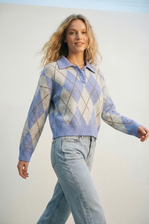 Jersey de punto de rombos en azul con cuello de polo