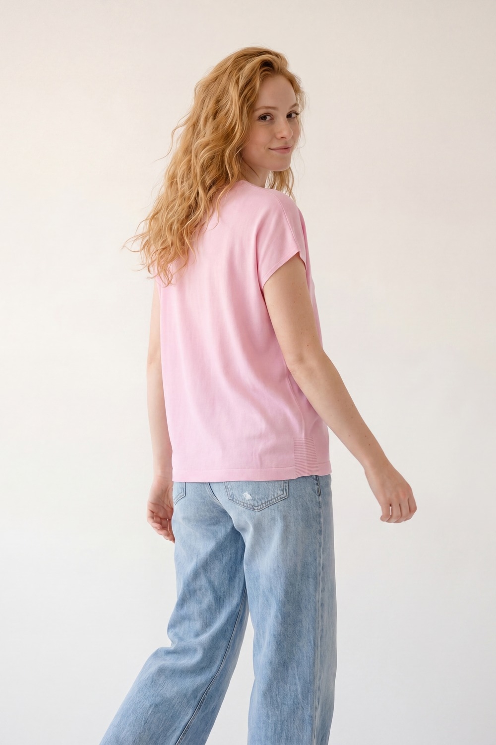 Jersey de punto rosa de corte relajado y cuello en V