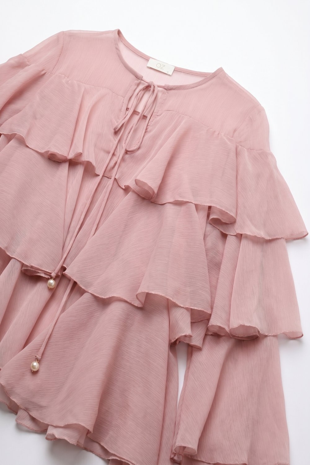 Blusa con Volantes en Capas y Lazo en el Cuello de Gasa Rosa