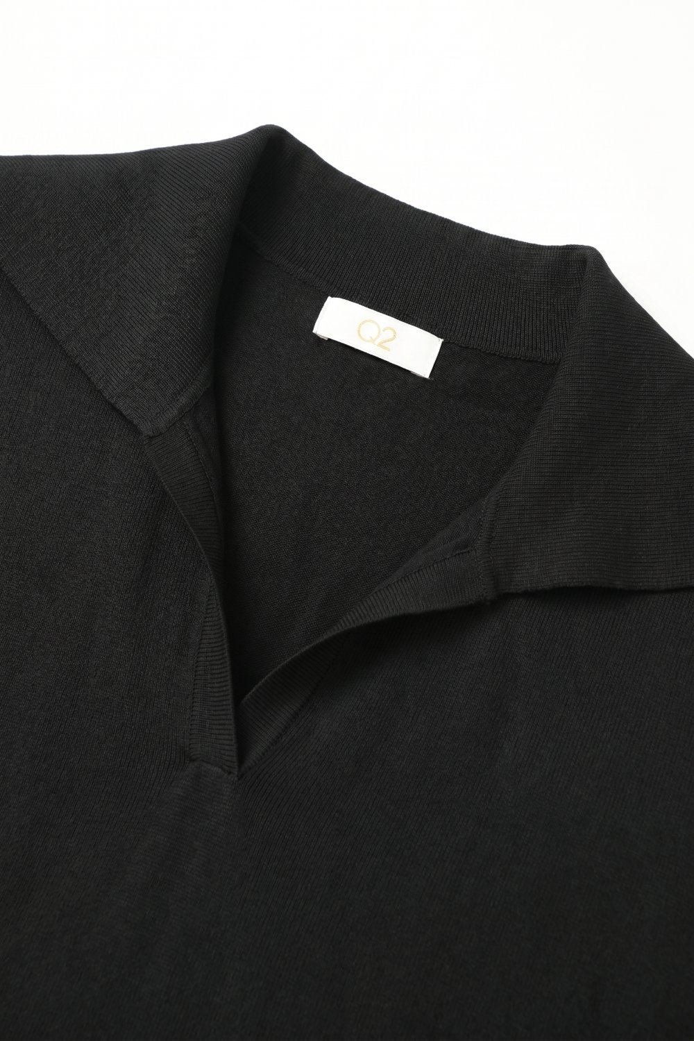 Polo Negro de Punto Fino con Cuello y Dobladillo de Canalé Ajuste Regular Polo Negro de Punto Fino con Cuello y Dobladillo de Canalé Ajuste Regular