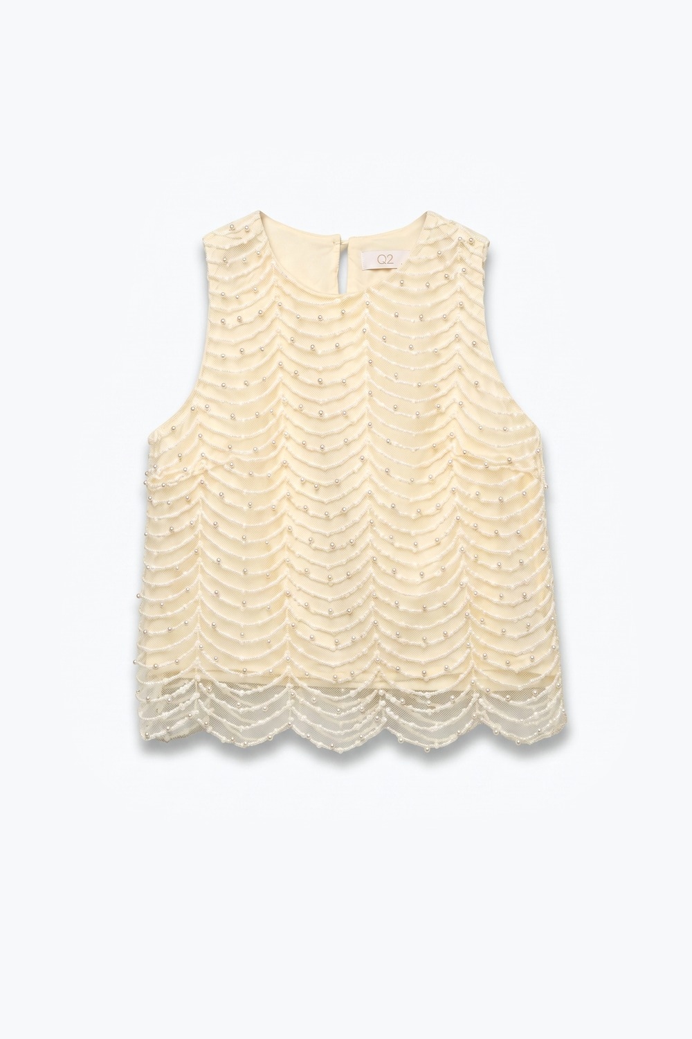 Blusa sin mangas con dobladillo de concha y cuentas adornadas en color crema Blusa sin mangas con dobladillo de concha y cuentas adornadas en color crema