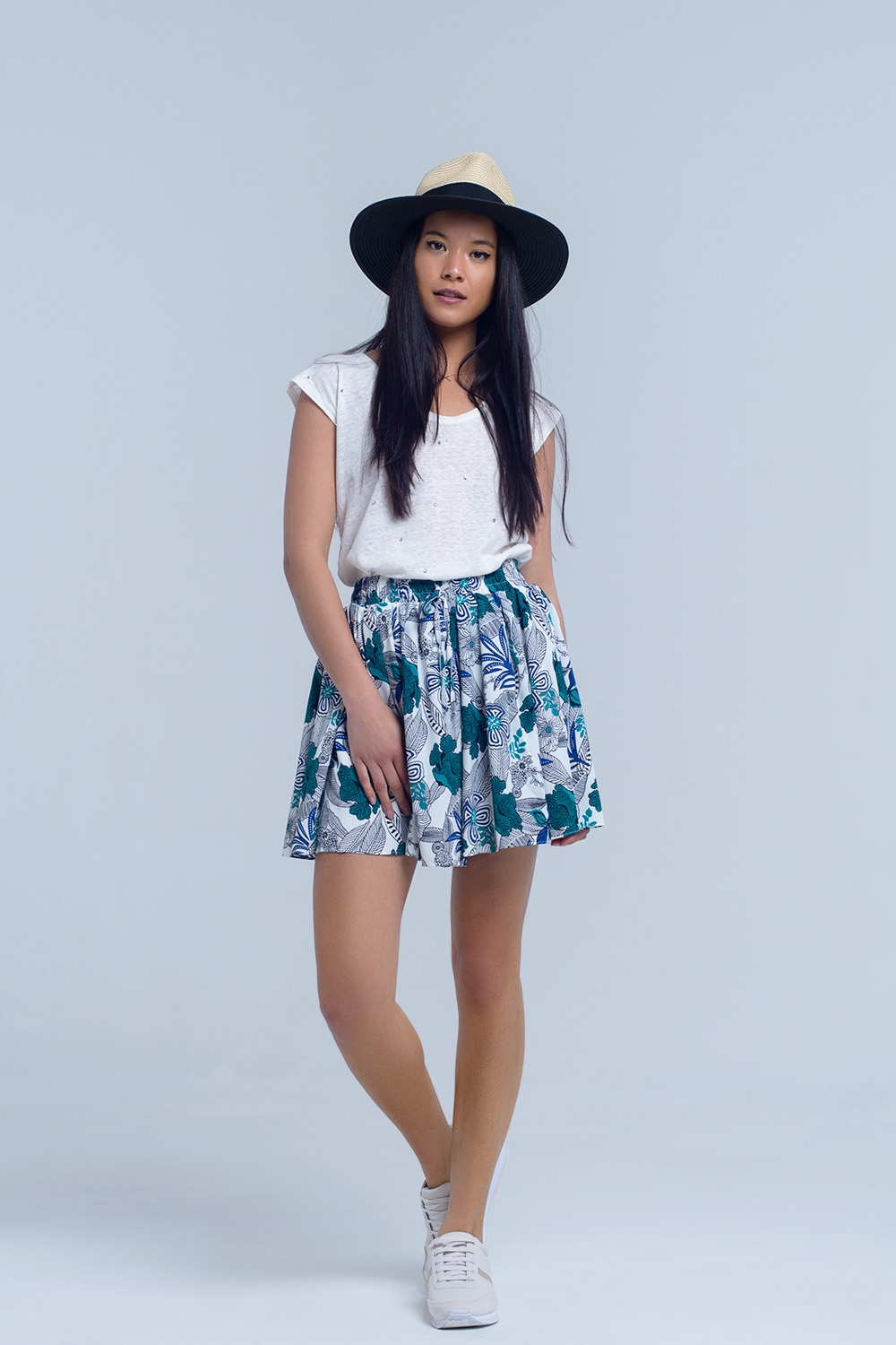 Mini falda pantalon azul con estampado floral Mini falda pantalon azul con estampado floral