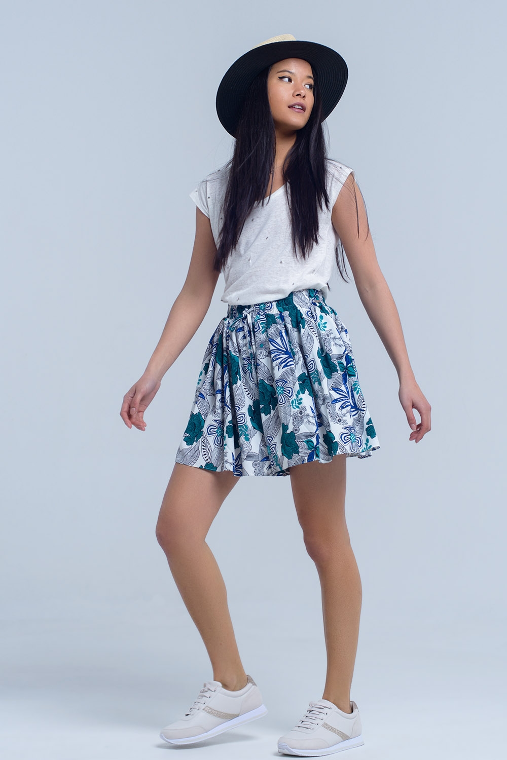 Mini falda pantalon azul con estampado floral Mini falda pantalon azul con estampado floral