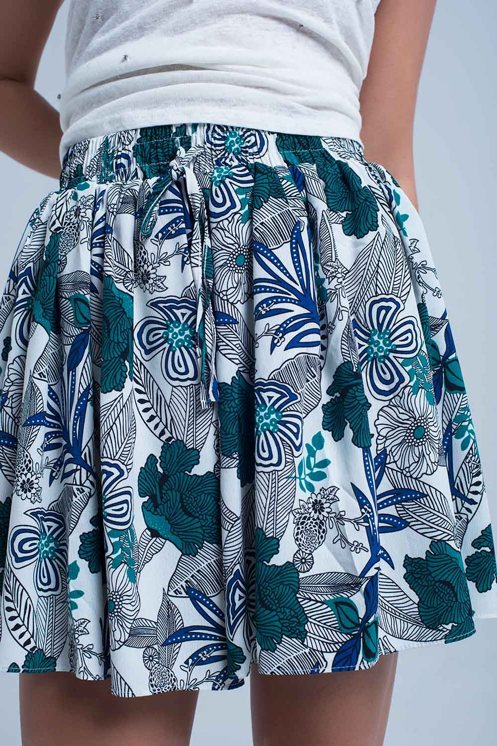 Mini falda pantalon azul con estampado floral Mini falda pantalon azul con estampado floral