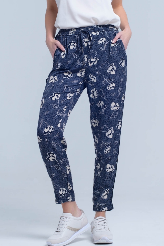 Pantaloni blu navy con stampa floreale