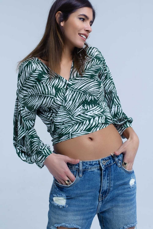Green leaf print blouse with plunge neck