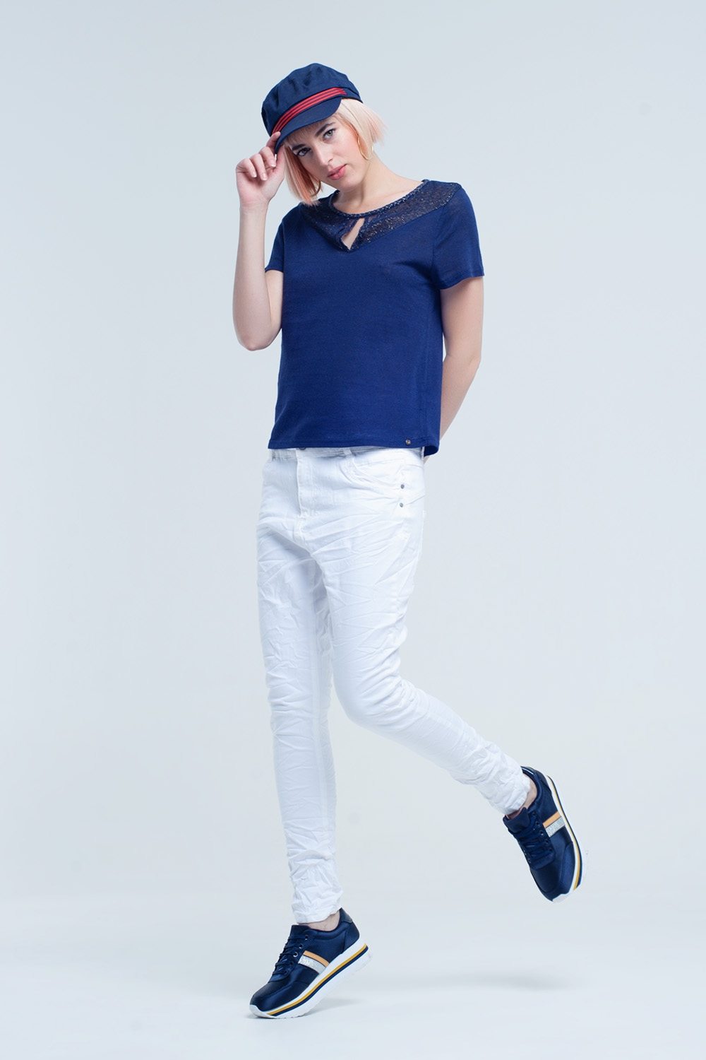 Jeans blancos arrugado con bolsillos Jeans blancos arrugado con bolsillos