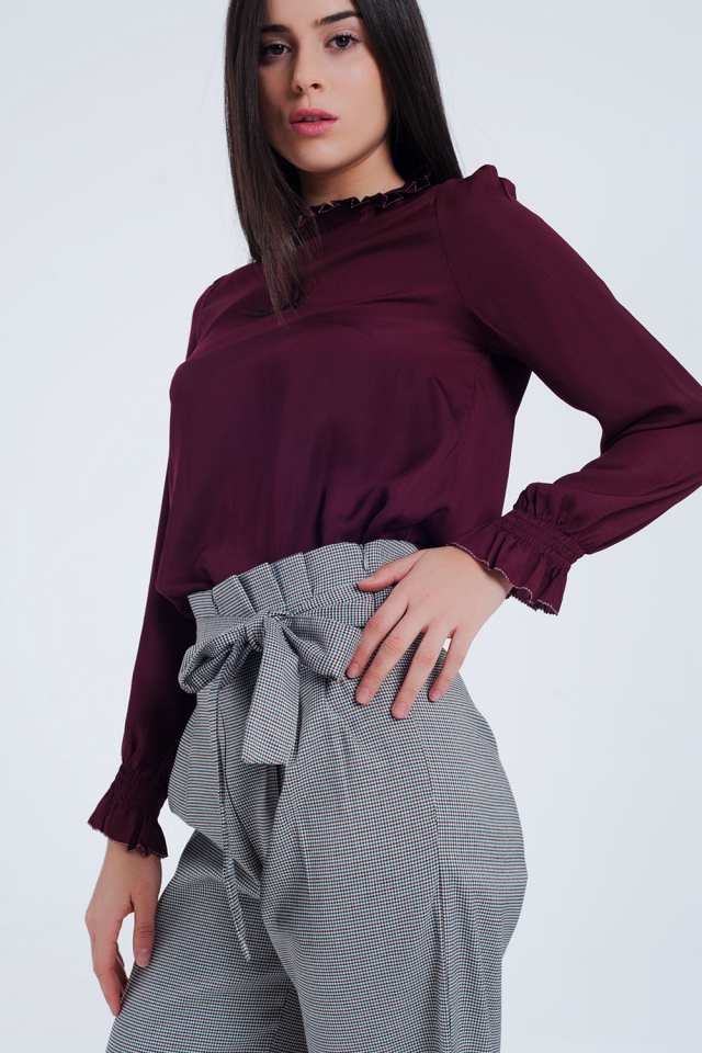Maroon shirt with neck and sleeve detailed ends