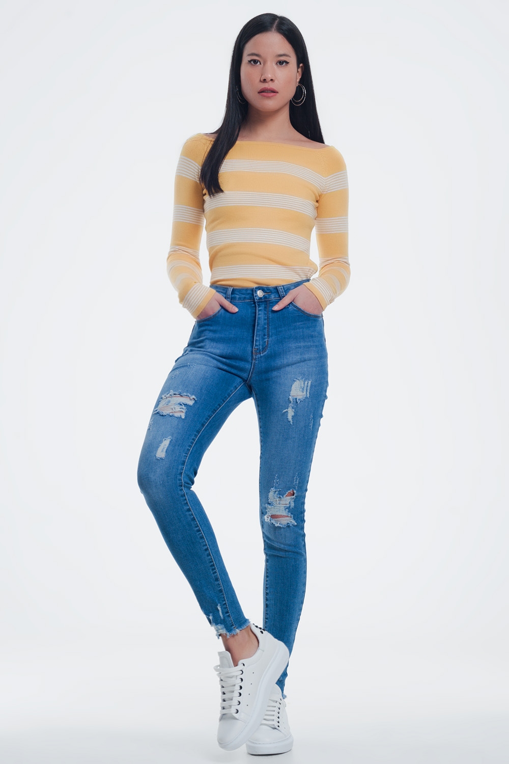 Jersey con cuello barco a rayas en color amarillo Jersey con cuello barco a rayas en color amarillo