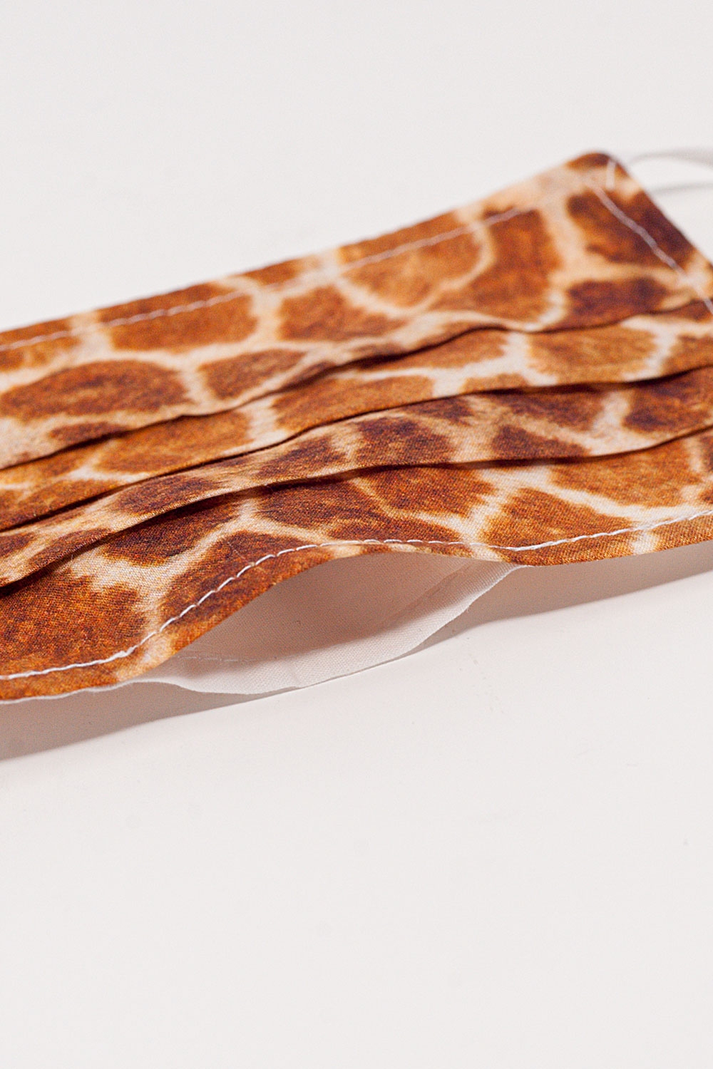 Paquete de 5 unidades Mascarilla camel estampado de jirafa