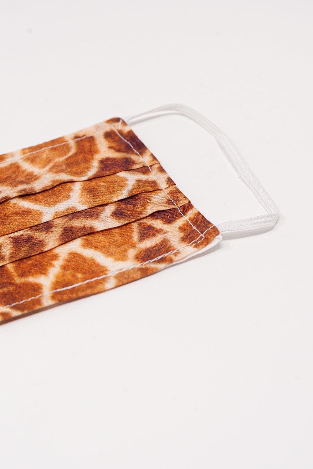 Paquete de 5 unidades Mascarilla camel estampado de jirafa