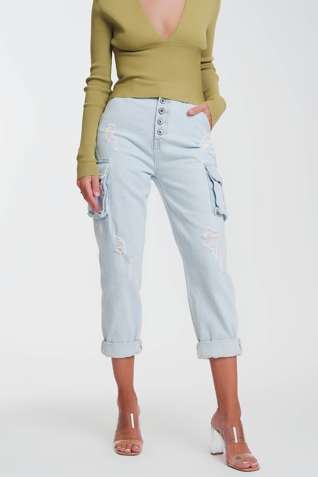 Light blue straight jeans ripped with side pockets