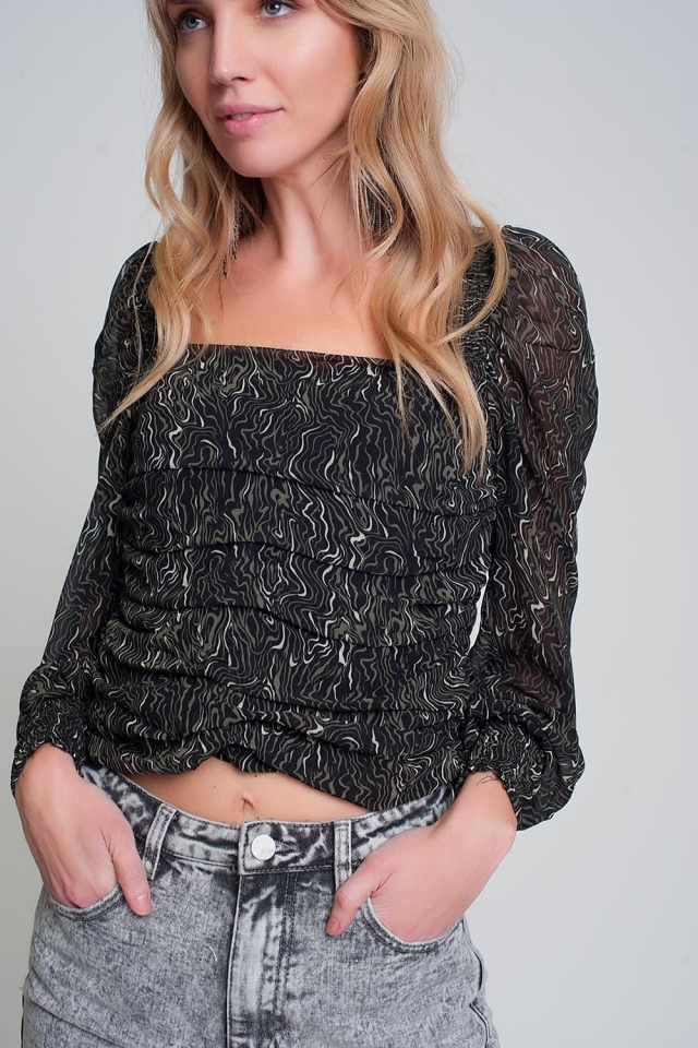 Doorzichtige blouse met lange mouwen geoprint in zwarte kleur met elastische manchetten