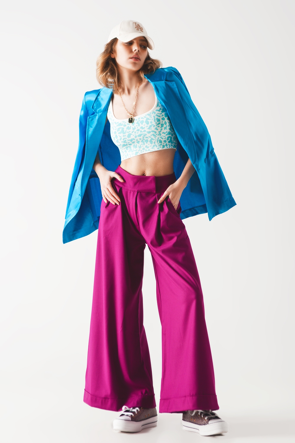 Top punto ligero en estampado animal turquesa Top punto ligero en estampado animal turquesa
