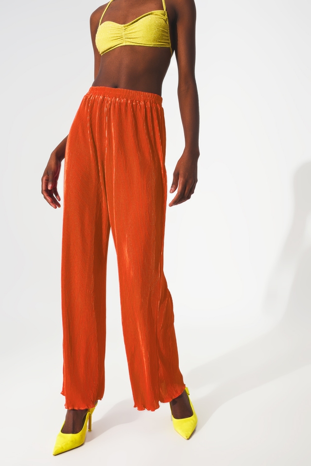 Satin pleated wide leg pants in orange