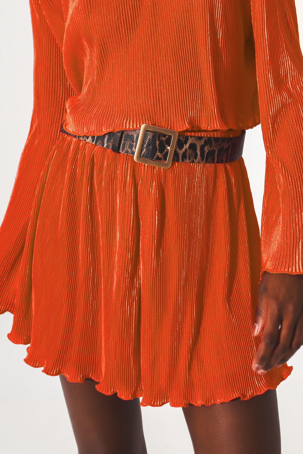 Shorts plisados en naranja Shorts plisados en naranja