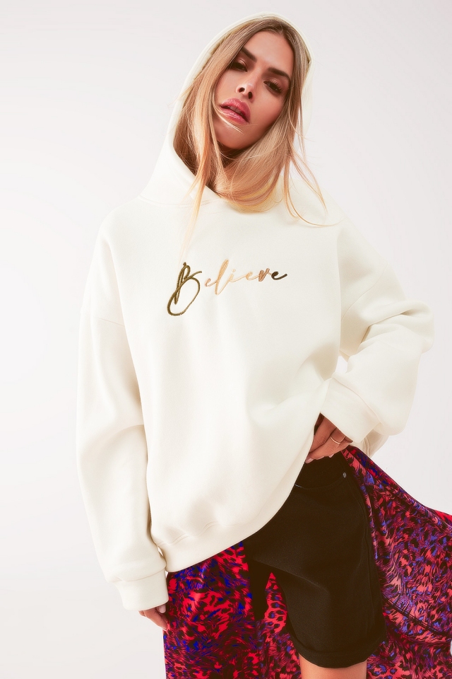 Capuz oversize em beige com letras Believe