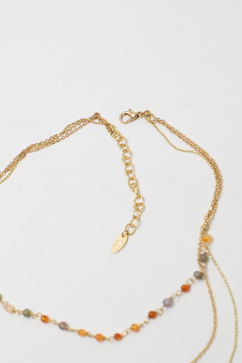 Collar 3 en 1 con dije de estrella y cuentas multicolores.