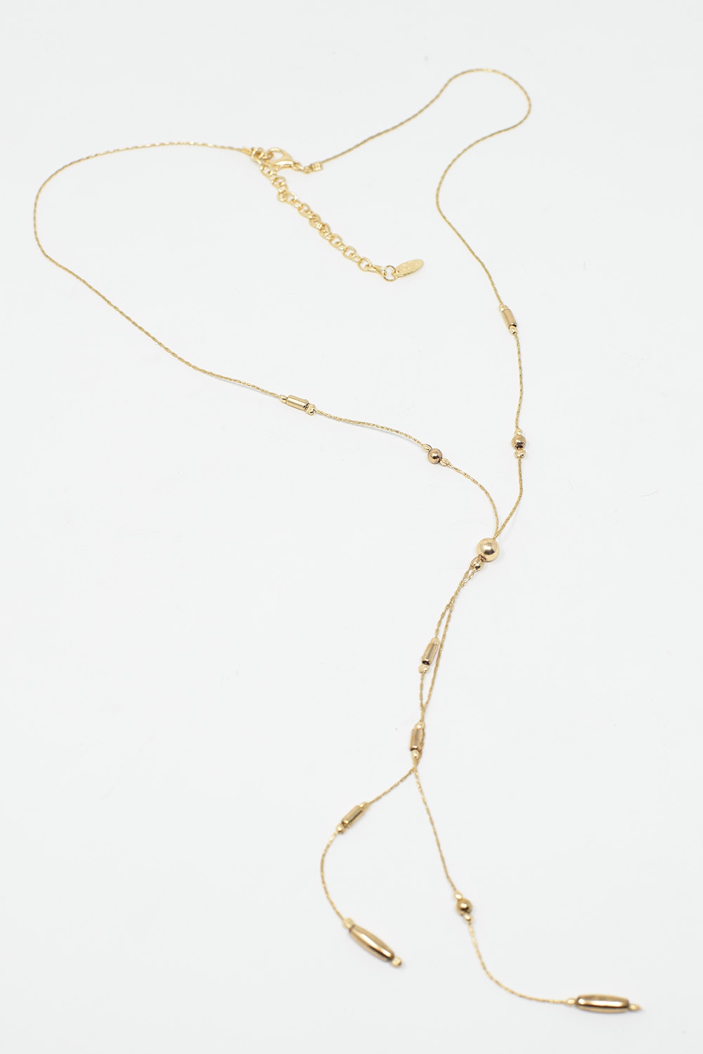 Collar largo dorado con cuentas doradas y borla dorada larga Collar largo dorado con cuentas doradas y borla dorada larga
