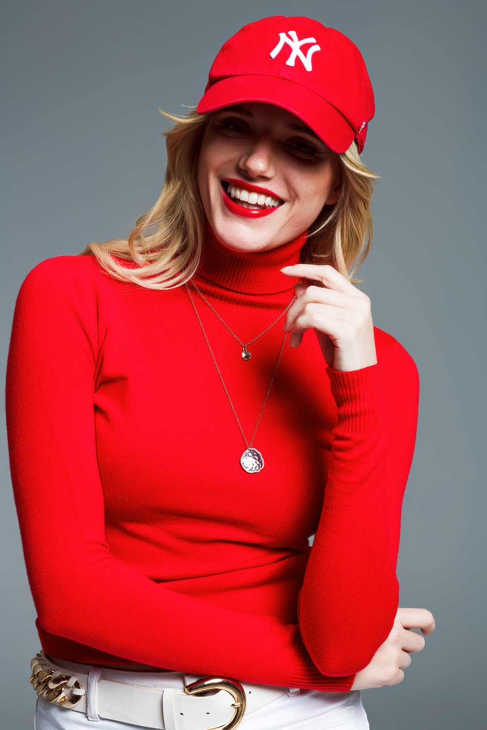 Jersey de punto fino y cuello alto en rojo
