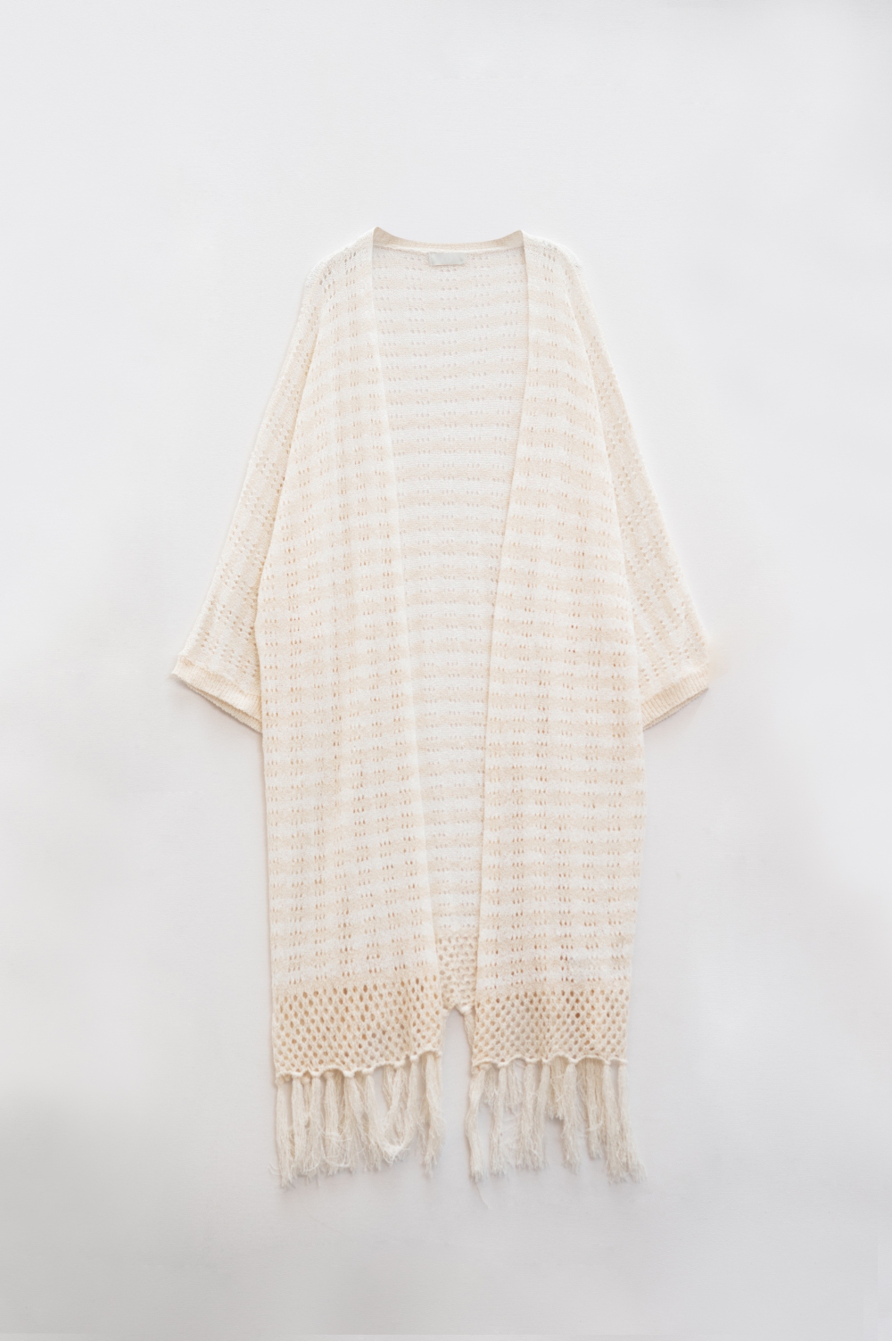 Poncho Crema Estilo Boho Con Punto Pointelle A Rayas Y Detalles De Flecos Poncho Crema Estilo Boho Con Punto Pointelle A Rayas Y Detalles De Flecos