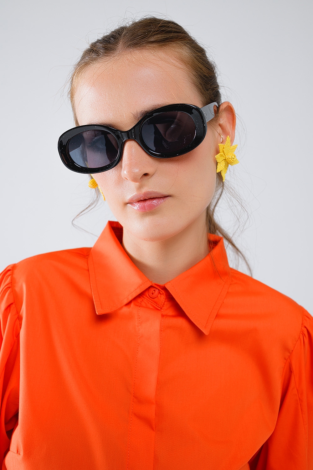 Camisa b&aacute;sica de popel&iacute;n naranja con mangas largas globo