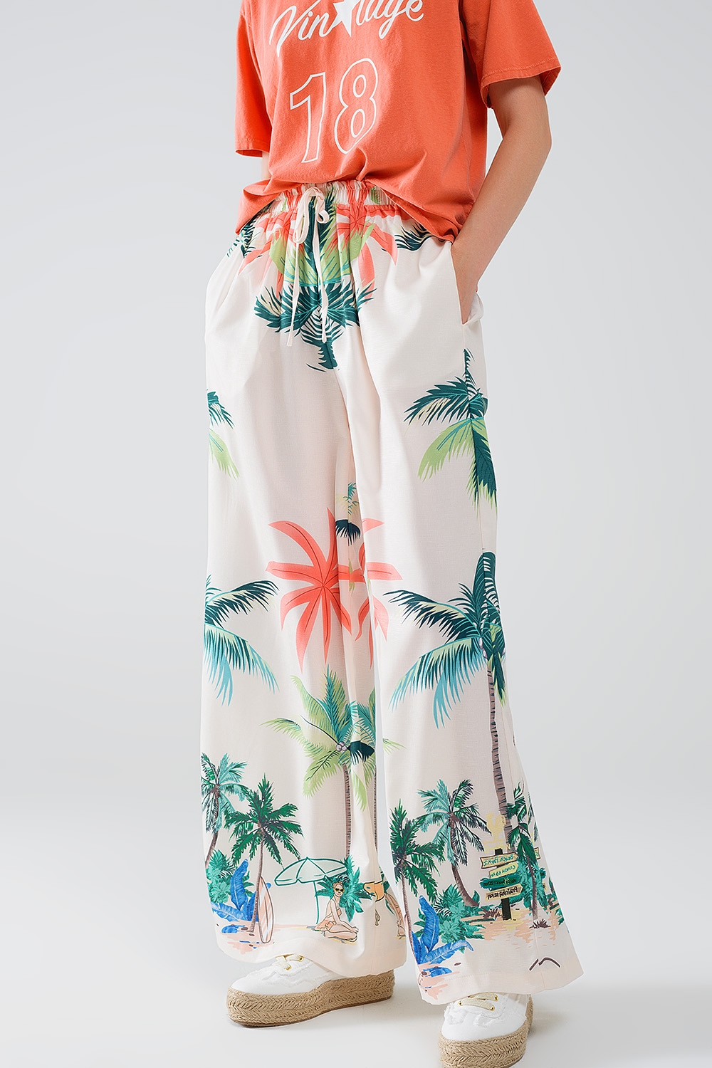Pantal&oacute;n recto crema con estampado playero y cintura el&aacute;stica