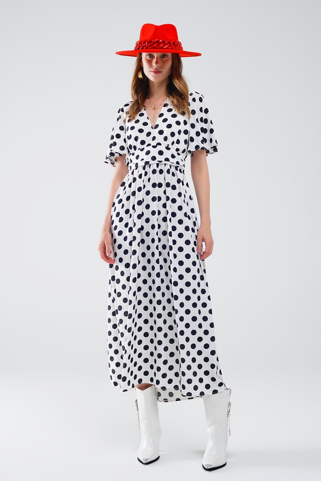 Maxi vestido de lunares con detalle de espalda abierta