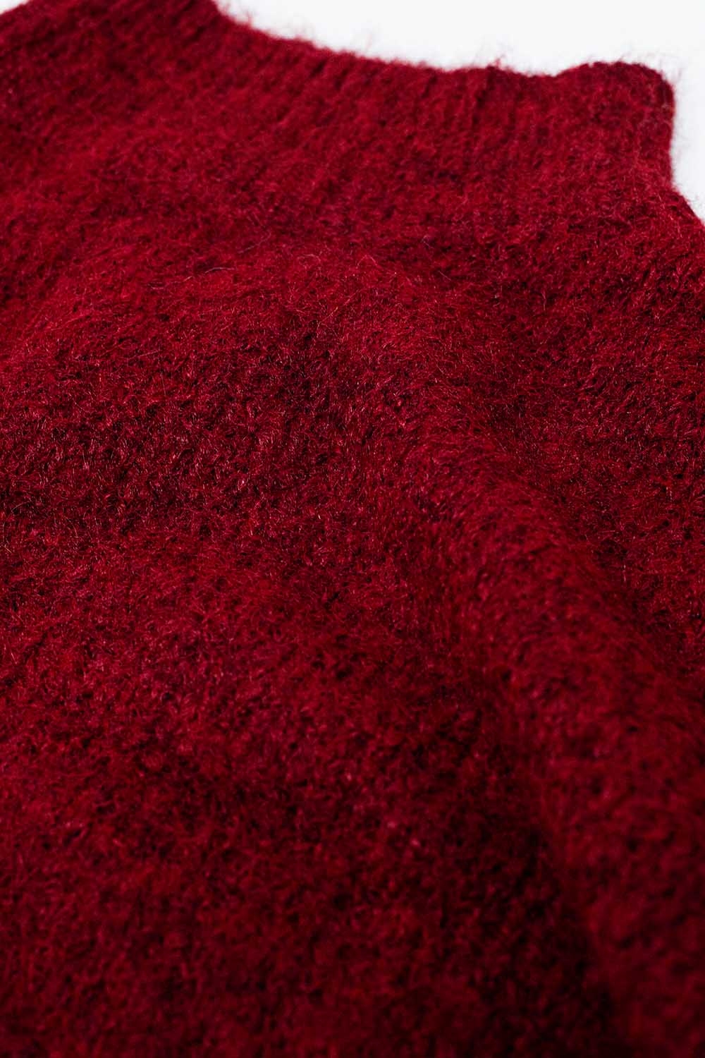 Jersey rojo esponjoso con cuello alto y mangas globo Jersey rojo esponjoso con cuello alto y mangas globo