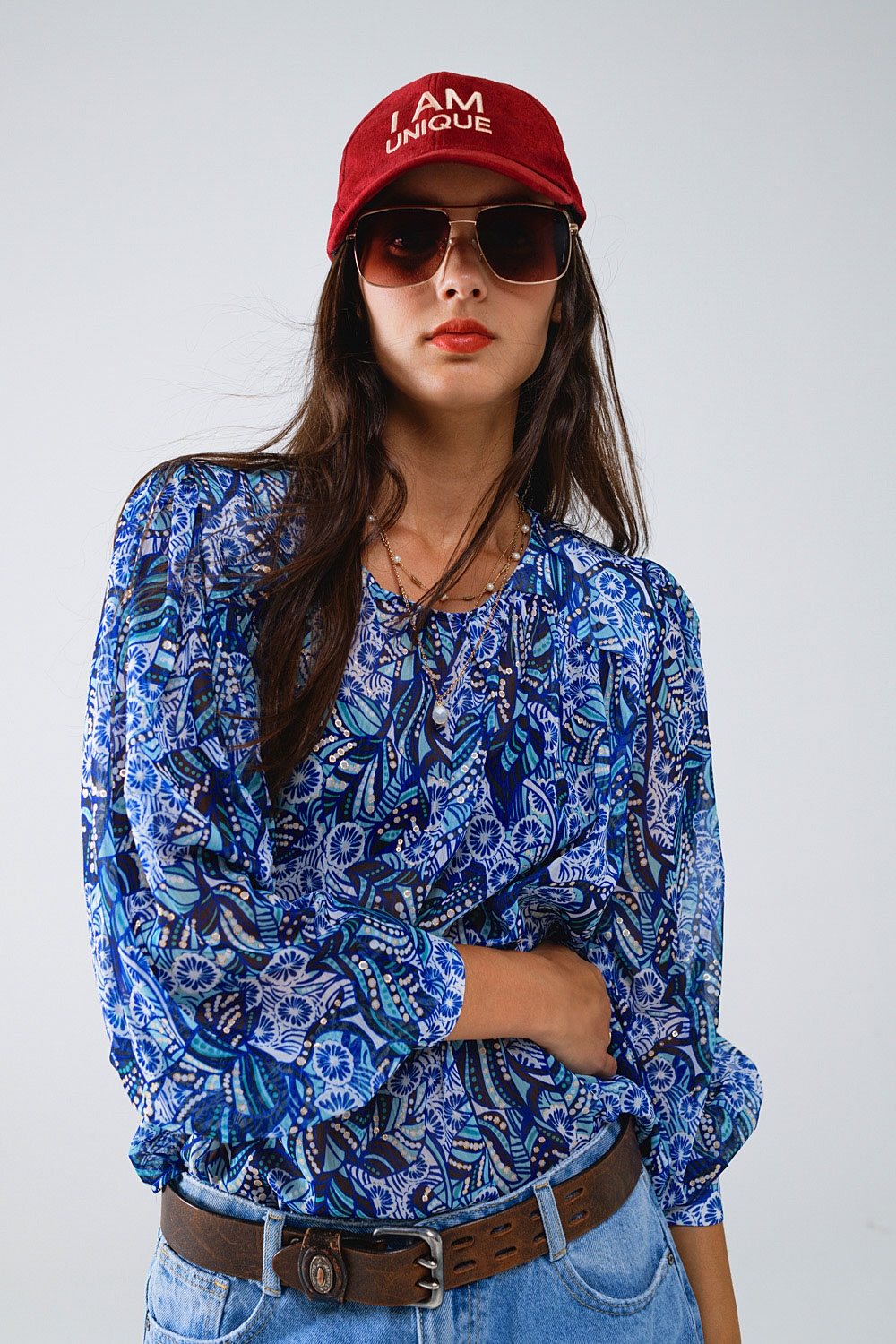 Blusa con estampado abstracto y mangas globo en azul Blusa con estampado abstracto y mangas globo en azul
