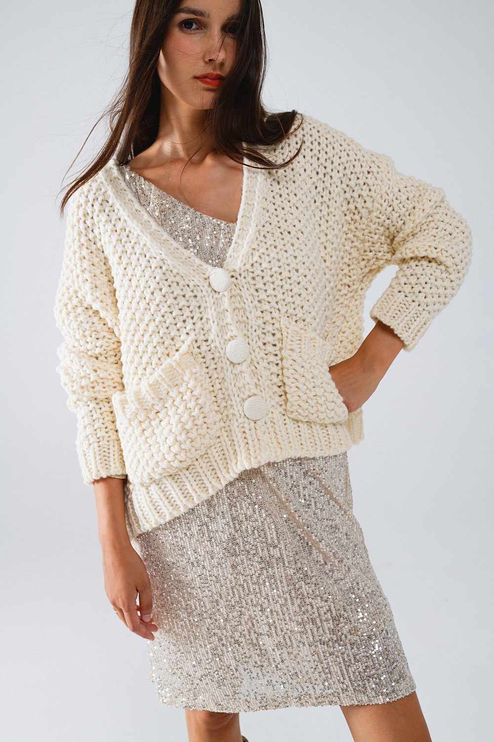 Chaqueta oversize de punto grueso beige con bolsillos